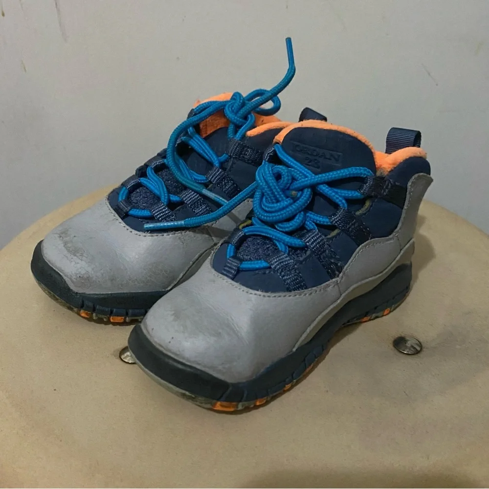 Nike Kids Gray and Blue Sneakers with Orange Accents